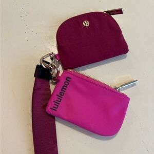sonic pink dual pouch wristlet